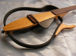 glorifiedguitars:  Yamaha Silent Guitar[Source: