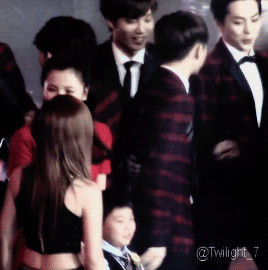 kyungsol: jongin grabbing kyungsoo by the waist what resulted in kyungsoo punching