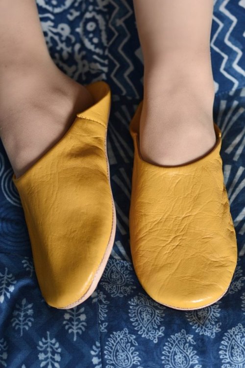 The perfect slippers for a lady to slip on when she gets home.The perfect slipper to slip off when r
