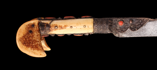 peashooter85:Yatagan with red coral studded bone hilt, Ottoman Empire, 18th-19th centuryfrom Karabela Auctions