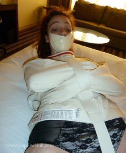 thegagproject:  I do love microfoam tape!! :D #tapegagged #submissive #gagged #helpless #straightjacket