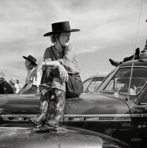 gentlemanlosergentlemanjunkie:  September 1941. “Dude at rodeo in Ashland, Montana.” Whose ponies are all under the hood. Medium format negative by Marion Post Wolcott.