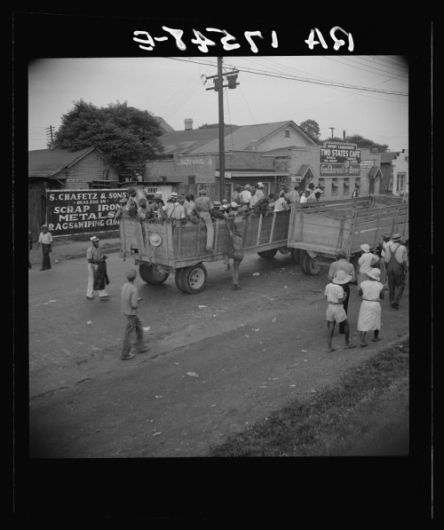 Cotton hoers from Memphis, Tennessee are carried by trucks to the Arkansas plantations (1937).These 