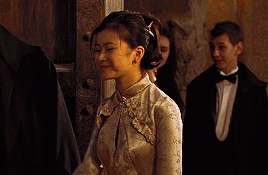 elevensickles:The Ravenclaw team, dressed in blue, were already standing in the middle of the field.