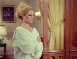 bardotinmotion:  Brigitte Bardot shows you how to stride out of your bath like the goddamn Queen of Versailles.
