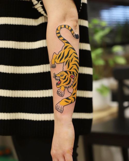 Yellow tigerSwap to see closerThanks Dominika#patrykhilton #tigertattoo #yellowtiger #panterabydgosz