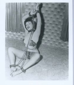 heart-shaped-apple:  Bettie in chains 