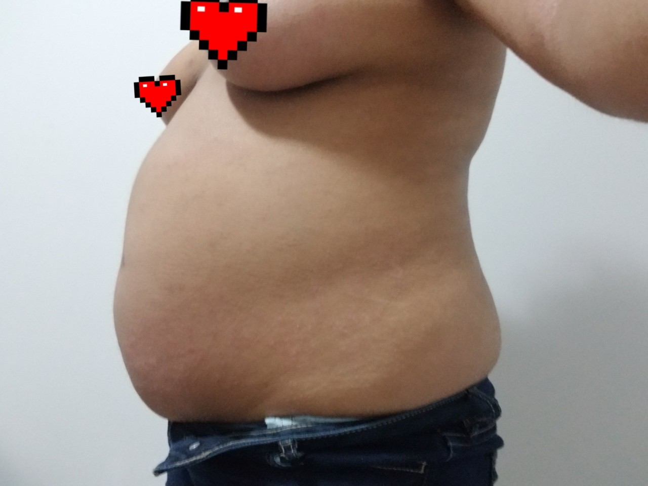 ohbelly:I can’t stop getting fatter. I’m trying to slow it down because all of my clothes are getting tight. my belly is poking out the bottom of most of my shirts, when I’m full and sit down. I can’t fit into any of my jeans and