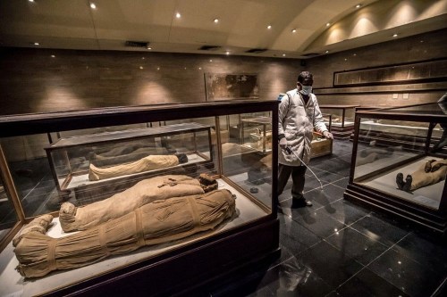 Cleaning crews disinfecting the Egyptian Museum in Cairo amid the coronavirus COVID-19 pandemic, on 