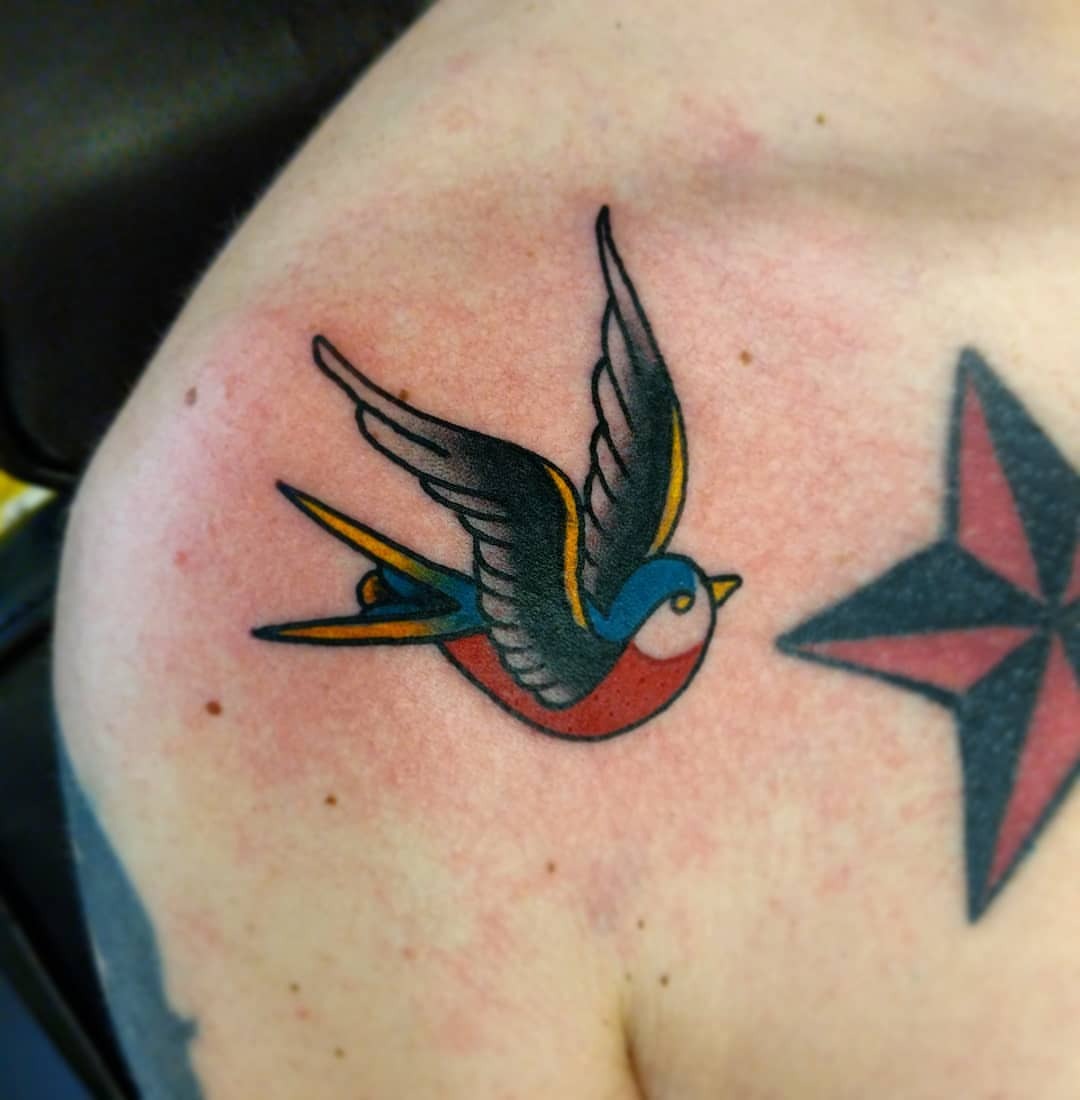 Sailor Jerry style Swallow by Paul Slifer Red Hot and Blue  rtattoos