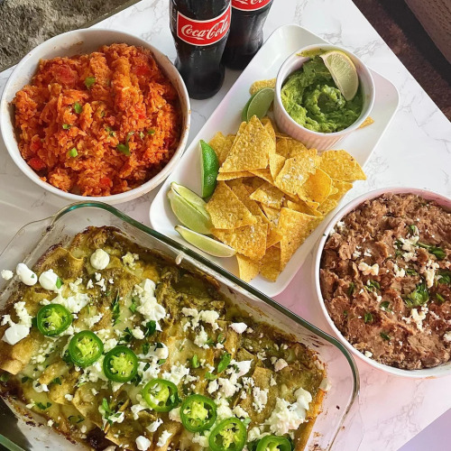 salsa verde enchiladas, refried beans, and red rice