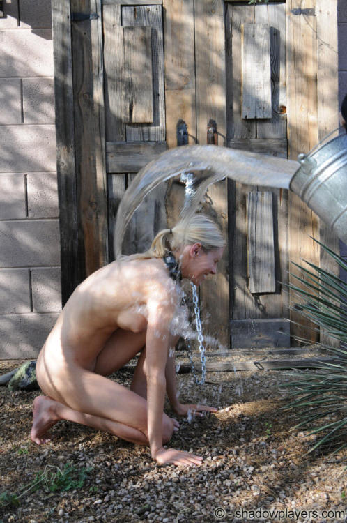 bondage-ponygirls-and-more: Giving your slave a cold water bath outdoors. More athttp://www.shadowplayers.com DVDs for sale by mail (best price) at:http://www.shadowplayers.com/Sales.html  Or online through http://videos4sale.com/1028 Download video clips