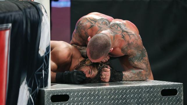 rwfan11:  ….WWE .com’s caption for this shot is just icing on the cake! LOL