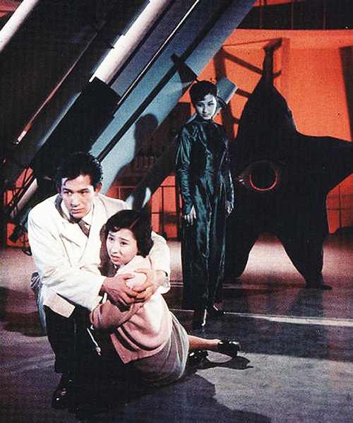 kaijusaurus:  Publicity still for Daiei’s WARNING FROM SPACE. The film’s Pairan aliens were designed by the prominent avant-garde artist Tarō Okamoto.   