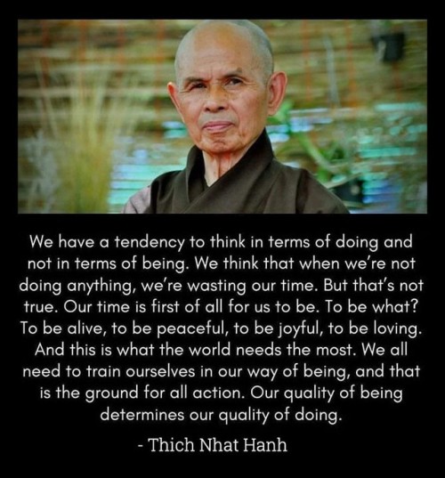 [Image: Photo of Zen Master Thich Nhat Hanh with water and reeds behind him. Below the photo is a qu