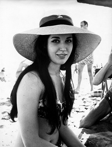 Italian-born Countess Patrizia De Blanck wearing swimsuit at the sea