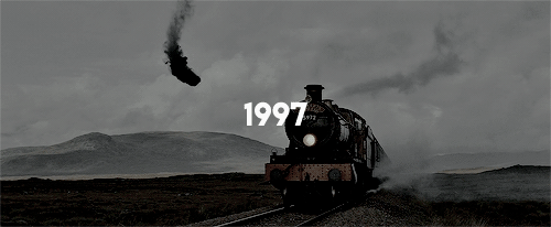 ravnclaws:       A scarlet steam engine was waiting next to a platform packed with people.          A sign over head said Hogwarts Express, 11 o'clock.