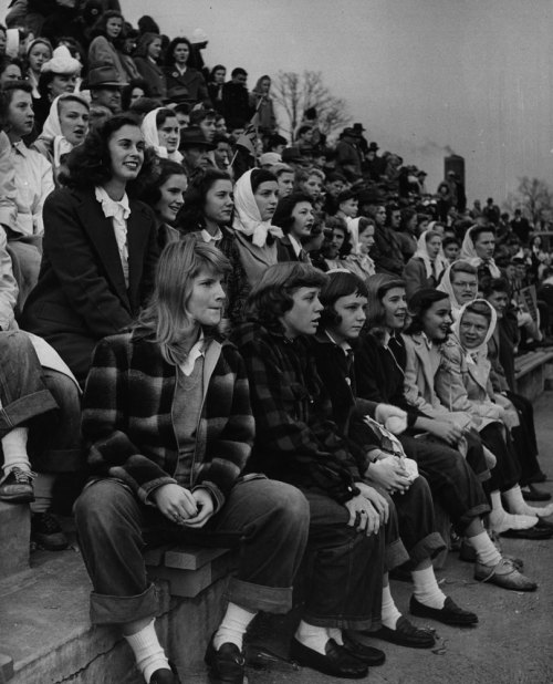 ttoska:Teenage girls at a football game, Missouri, 1944. By Nina Leen