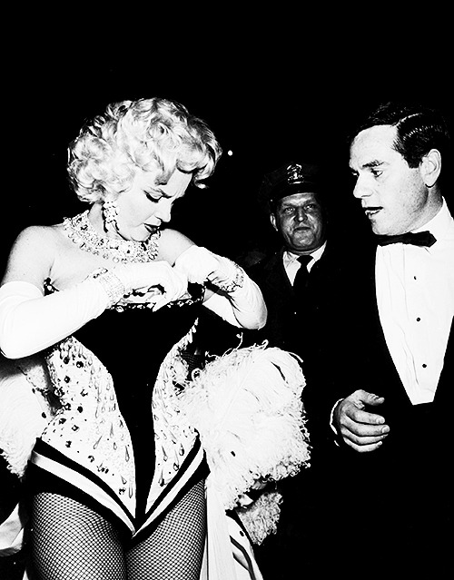 mostlymarilynmonroe:  Marilyn and Milton, photographed by Marvin Scott, at the opening night of the 