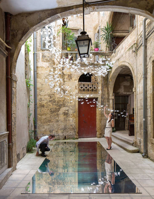 culturenlifestyle:Flock of White Origami Birds Invade French CourtyardFrench designers Maxime Derrou