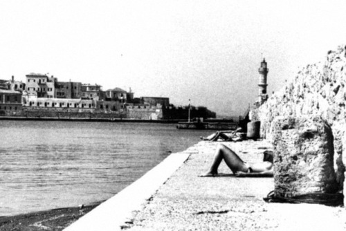 aestheticdivision: Sunbathers at the old port, Chania, 1970s