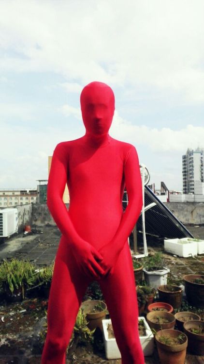 (China) Red Man on The Rooftop