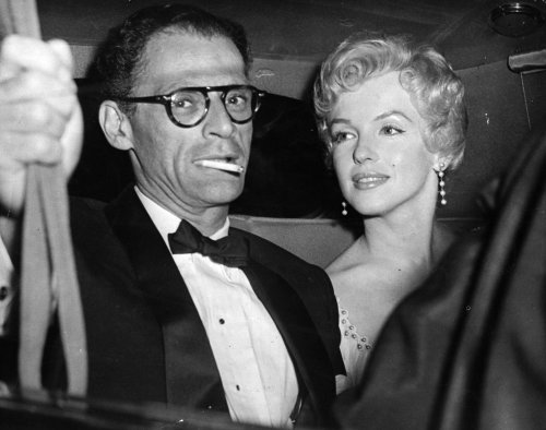 Marilyn Monroe and Arthur Miller on their way to Terrance Rattigan’s party in London, England,