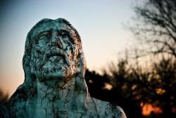 destroyed-and-abandoned:   Weathered Jesus in old cemetery. West IL via whiskeypicnic Read More