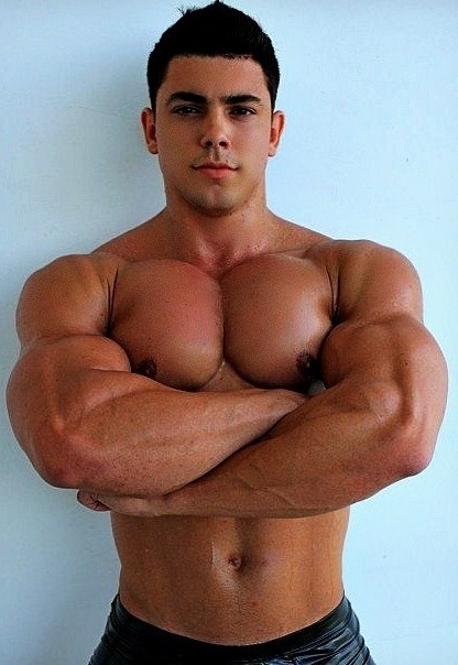 muscletits:  Proud.  And for good reason.  Inviting a very heavy bondage and discipline session for those muscles.
