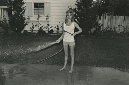 artisticstuffetc:  Artistic Stuff. Create Better World. Woman watering her lawn, 1972John Divola via