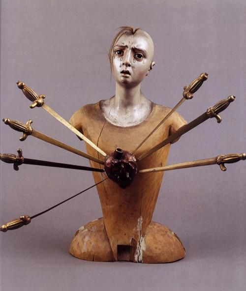 neshamama:1. Our Lady of the Seven Sorrows, 18th century, Polychromed wood2. Ana Mendieta, “Mu