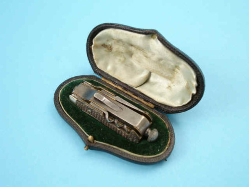 Rare cased pocket knife/pistol by Rodgers and Crooke, late 19th century. Gun is cocked by pulling kn