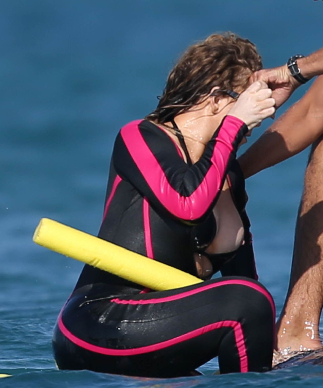 blackfemalecelebrities:    Mariah Carey - Wearing a wetsuit in Italy - 06/21-2015