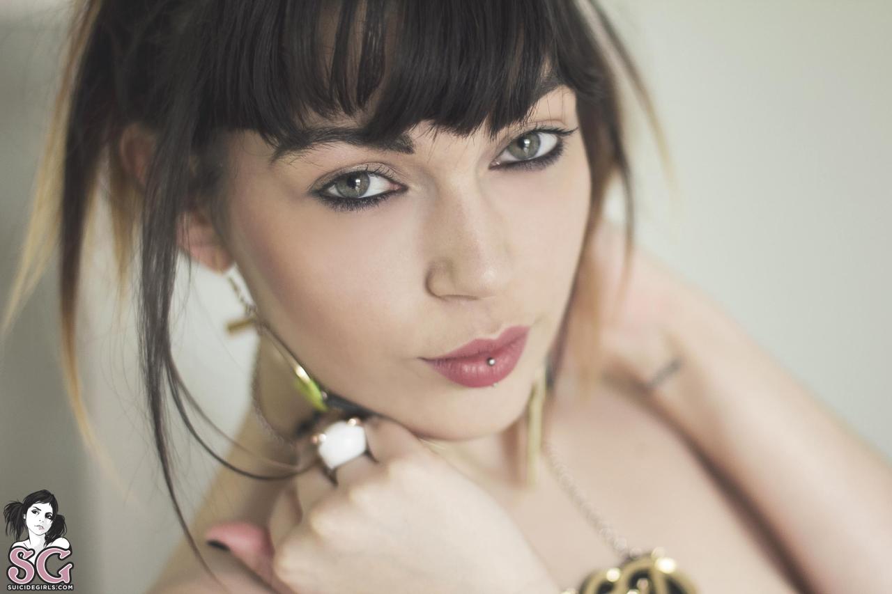 past-her-eyes:   Dendeville Suicide For more South African SuicideGirls Sweet tattoo,