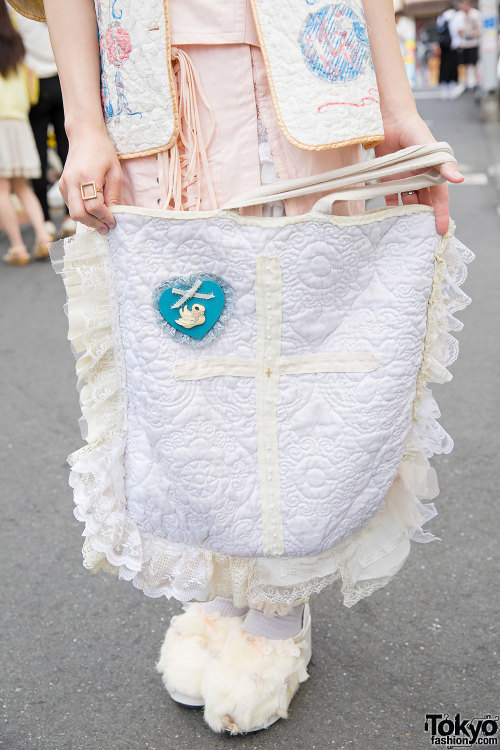 Yumi on the street in Harajuku with cult party kei-inspired makeup, pastel resale/vintage fashion, a