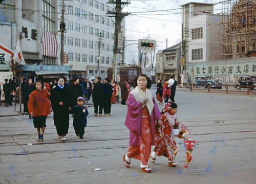 People walk on the street to make the first shrine visit of the year at Yasaka Jinja Shrine on Janua