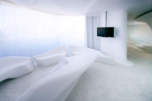 luxuryaccommodations:  Zaha Hadid Floor at Silken Puerta América Madrid One of the highlights of Madrid’s Hotel Puerta America is the floor designed by Zaha Hadid - the first woman awarded with the prestigious Pritzker Architecture Prize. Combing her
