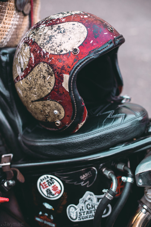 jaymacphotography: A vintage Hirotake Arai helmet, sitting pretty on a hardtail Shovelhead .