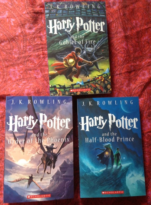 nicodiangeloisdead:  infallibleherondale:  maryannisawkward:  My new Harry Potter paperback set came in the mail! These have the cover illustrations by Kazu Kibuishi. Together, the set spines make Hogwarts castle and the illustrations around the set case