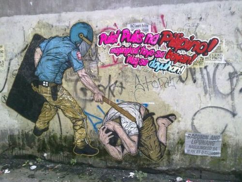 Street art against police brutality in the Philippines.