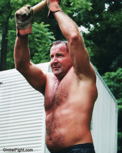 wrestlerswrestlingphotos:  sweaty man swinging sledge hammer working
