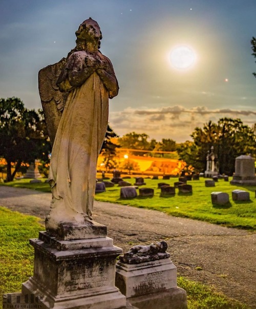 Katie and her baby under the full moon at Oak Hill Cemetery in Evansville, IN Photo taken by me
