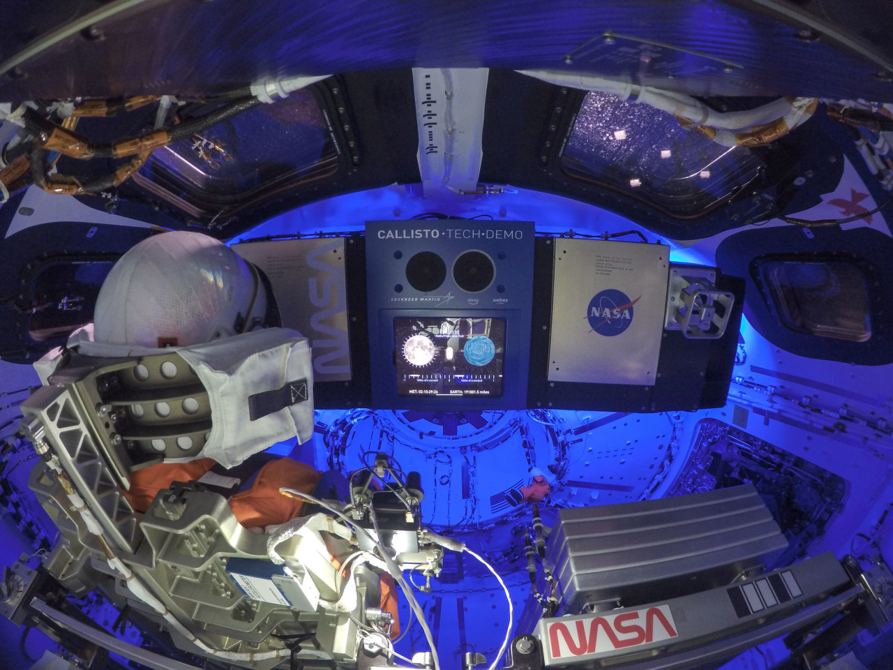 Commander Moonikin Campos is visible in the commander’s seat in this image inside of the Orion spacecraft. You can also spot Snoopy, the zero-gravity indicator aboard, floating in the background. Credit: NASA