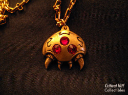 gamefreaksnz:  Parasite Pendant  Here’s a classy pendant for a classic game. These cute little endangered buggers are crafted out of solid brass, antiqued, polished to a soft shine, then decorated with red gems. They don’t want to hurt you, they only