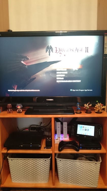 strange-wuff:  Cuz I’ve not posted it before, here’s my PS3/Wii U setup, featuring Sackboy, Sackgirl and my furry trash Amiibos.You can just about see a couple Guitar Hero guitars poking out from behind the TV ;DAnyway, I’m gonna see if I can get