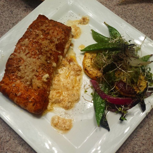 Blackened salmon stuffed with lemon zested mascarpone with a side of grilled salad of squash, red on