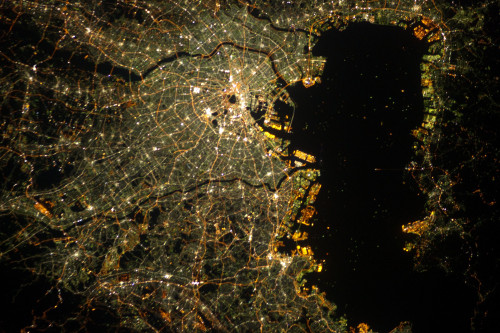 Tokyo (Japan, 2012) from the International Space Station.The brightest white lights in the city cent