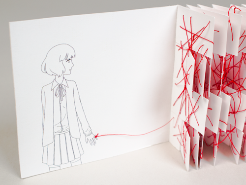 justpieit:  shihfu:  An old project from last year. One of a set of three. To extract the book from its box, both ends of the ribbons must be pulled at once. Pulling only one will get nowhere. Two people connected by the red string of fate are destined