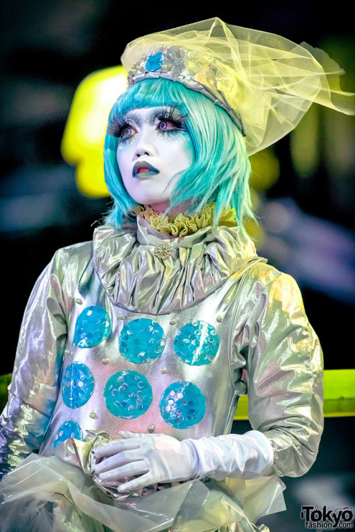 Japanese shironuri artist Minori on the street in Shibuya at night wearing handmade and remake fashi