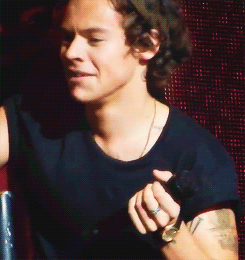  Harry attempting to throw a towel at the crowd, failing and then being disappointed